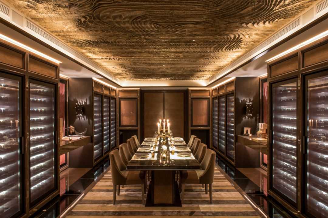 A dining room with elegant decor and candlelight for formal gatherings.